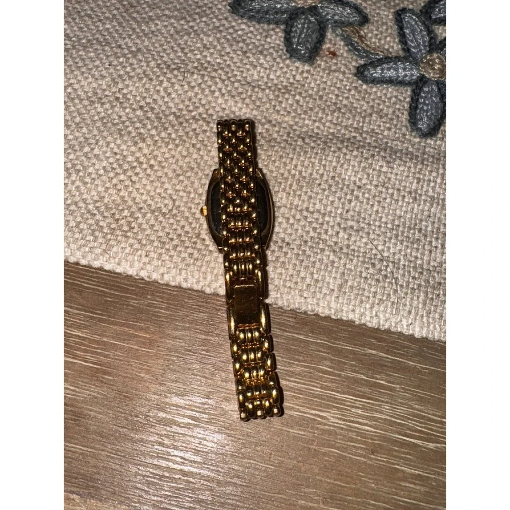 Armitron Gold Tone Womens Watch Rhinestone Bezel Mother of Pearl Style‎ Dial